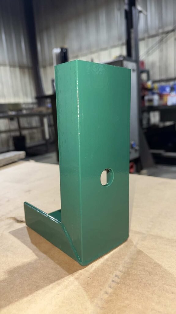 Custom steel J-bracket with powder coat finish fabricated for an eastern Iowa customer